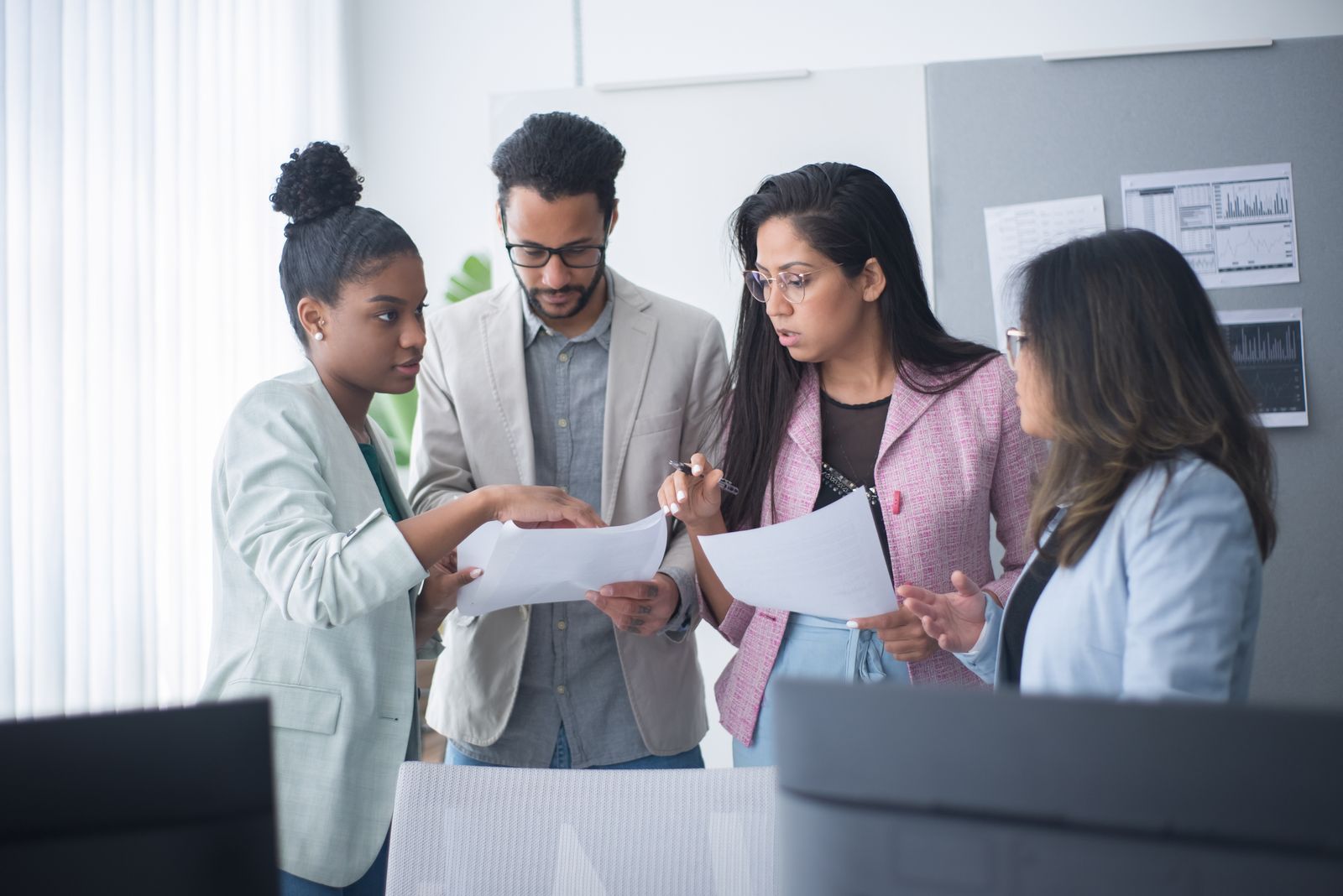 Healthcare professionals reviewing practice strategy together