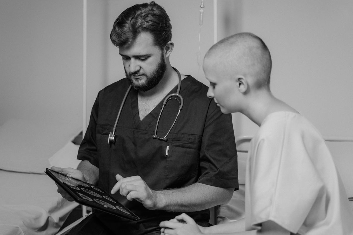 Physician reviewing Medicare revenue scan results on a tablet